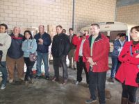 asistentes al acto de envío de alimentos